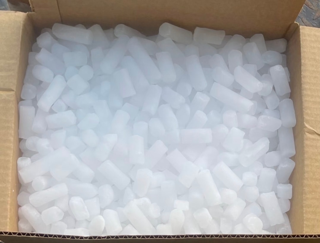 Dry ice pellets in a cardboard box — E-Z Dry Ice Company Philadelphia
